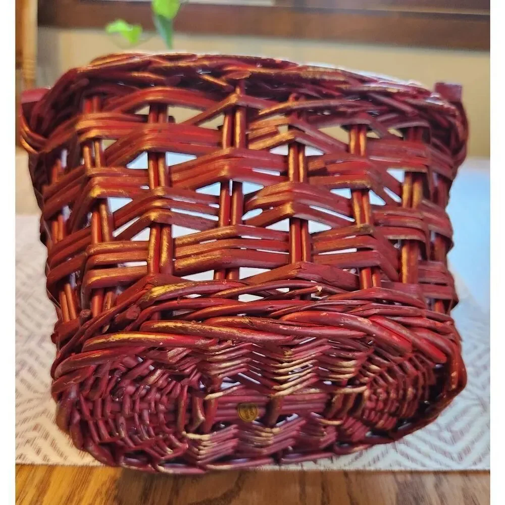 Red basket with wood handles